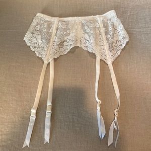 Vintage cream Christian Dior garter belt.